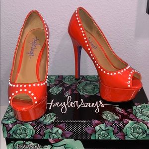 Orange patent leather platforms